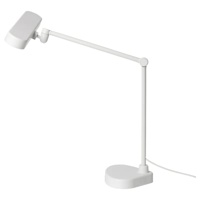 A white LÄKTRA desk lamp with an adjustable arm, suitable for studying or working.
