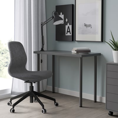 Minimalist home office: LINNMON desk, grey & black chair.