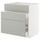 Modern light grey kitchen cabinet with drawers, part of IKEAs METOD system, clean minimalist design.
