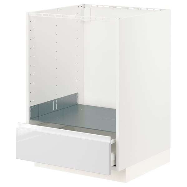 A white METOD kitchen cabinet frame with a high-gloss drawer front, modern design, and a sturdy base.