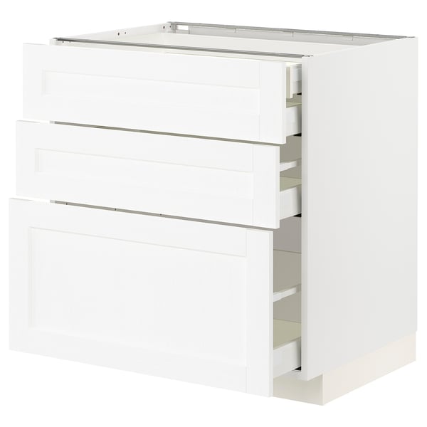 White METOD kitchen cabinet with multiple drawers.