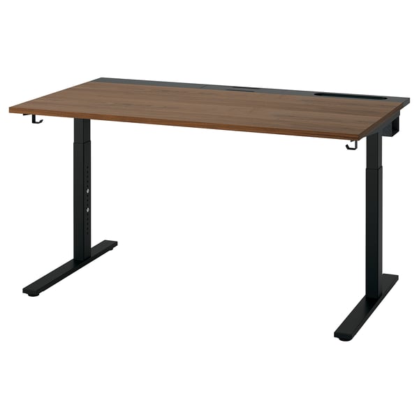 MITTZON adjustable desk in walnut and black. Rectangular top with black metal legs. Height-adjustable, suitable for standing/sitting.