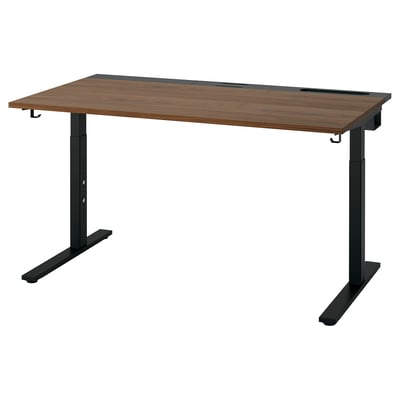 MITTZON adjustable desk in walnut and black. Rectangular top with black metal legs. Height-adjustable, suitable for standing/sitting.