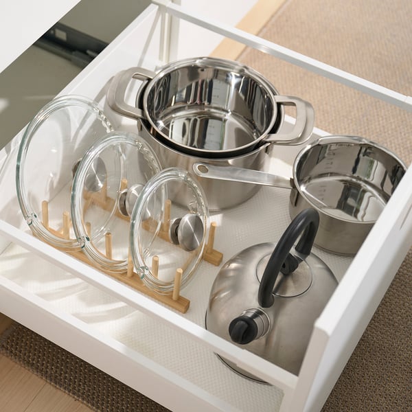 Kitchen drawer organiser for pots and lids, with dry place for six plates.