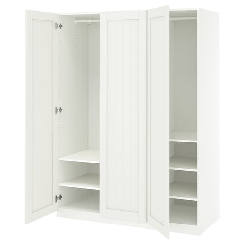 An open white ikea PAX wardrobe with shelves and storage space.