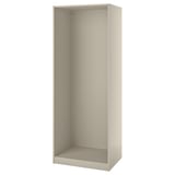 A beige ikea PAX wardrobe frame, rectangular in shape, with adjustable feet and pre-drilled holes for easy assembly.