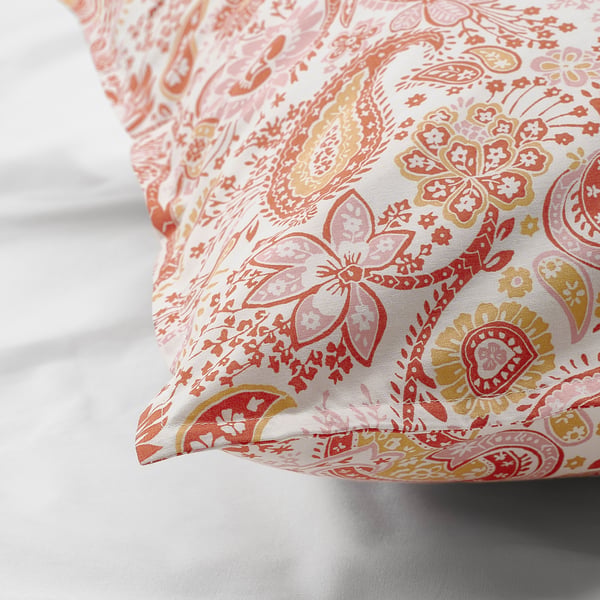 Paisley pillowcase with soft floral patterns on cotton-blend fabric, subtle sheen, on white surface.