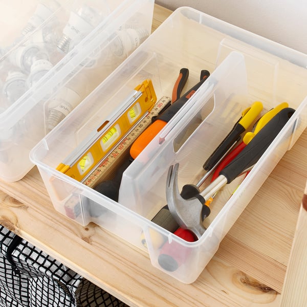 Clear plastic organiser with tools. Handles for easy access and carrying.