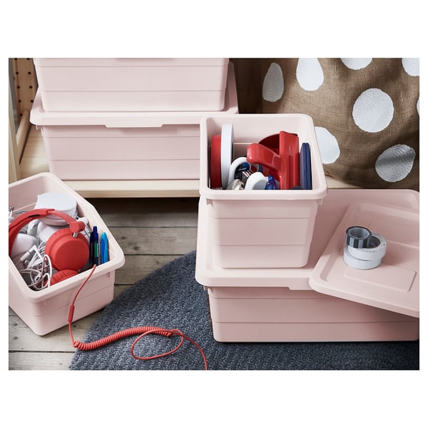 Six pink plastic SOCKERBIT boxes storing various small items, stacked and organised neatly.