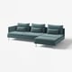 Modern teal sofa with chaise, 6 pillows, low profile, metal legs.