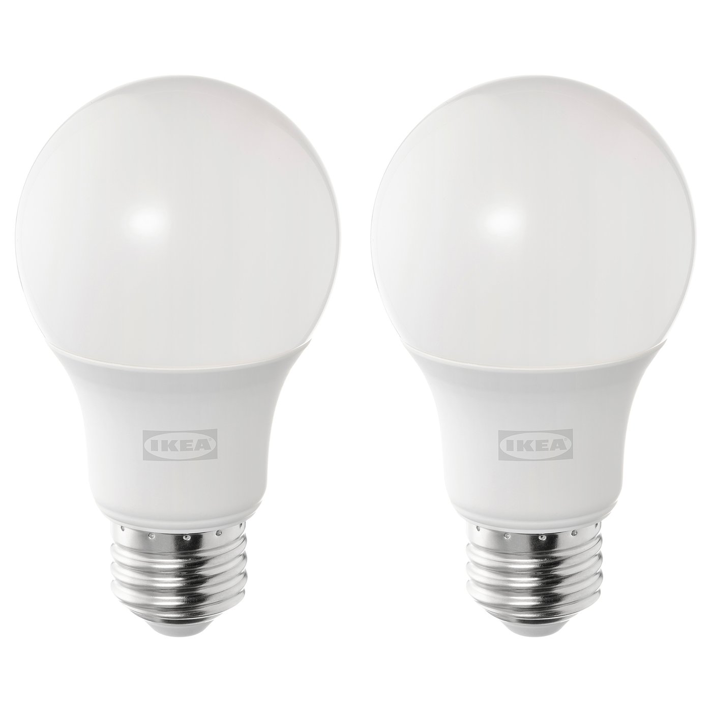 Two ikea SOLHETTA led light bulbs, white, spherical shape with metal bases, stand side by side.