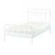 Depicts a white STJÄRNÖ metal bed frame with a curved headboard and footboard, featuring classic with modern details.