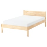 Natural wood TAXÅSKLINT bed frame with headboard, footboard, and angled legs.