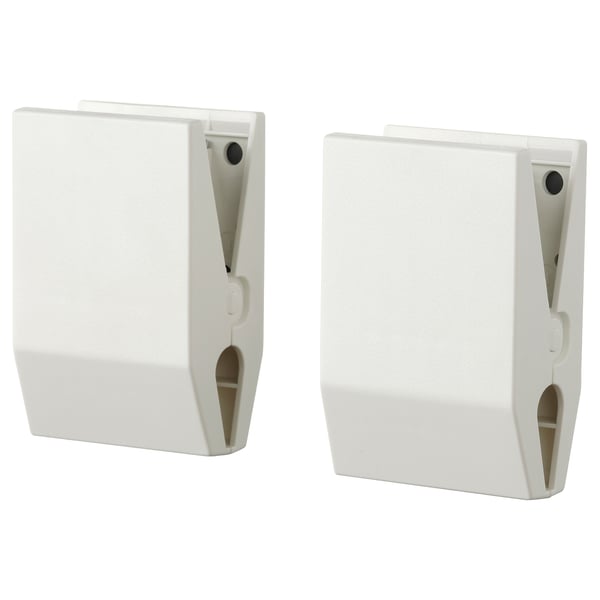 Two identical white plastic magnetic clips, ideal for attaching photos or notes to metal surfaces.