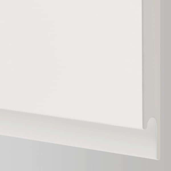Close-up of VÄSTERVIKEN cabinet front with smooth matte finish and integrated handle, showing quality and modern design.