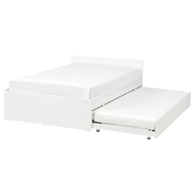 White modern bed frame with trundle, sleek design, metal hardware.