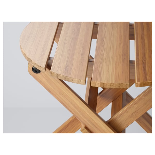 Wooden bamboo plant stand with intricate criss-cross base, showcasing natural wood grain and smooth finish.