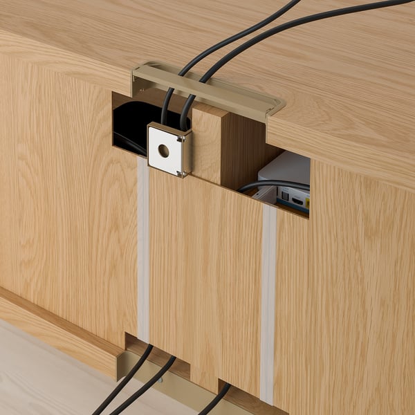Wooden tv unit with cable management. Cables fed through back, keeping area tidy.