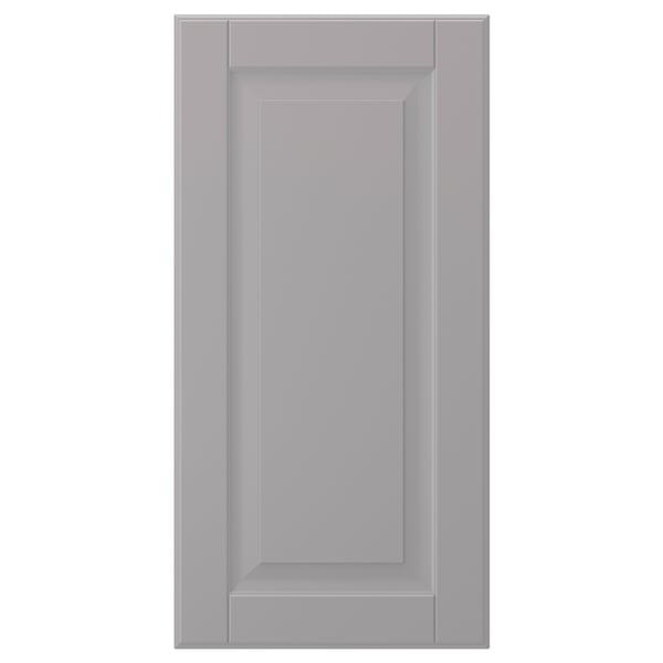 A grey BODBYN cabinet door. It has a smooth, rectangular shape with a bevelled panel design and a lacquered finish.
