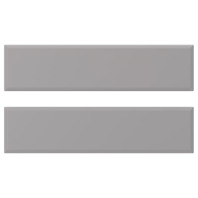 Two grey rectangular tiles with bevelled edges.