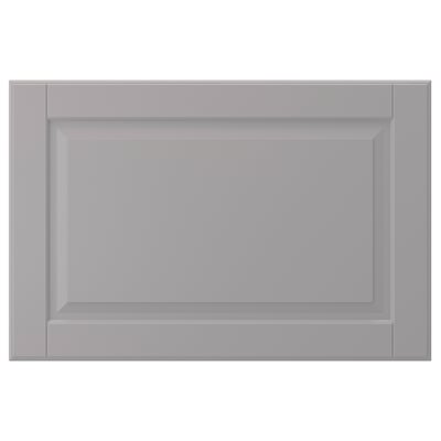 A grey BODBYN cabinet door with a bevelled panel design. Its rectangular and smooth, durable lacquered surfaces.