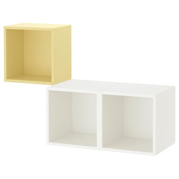 Two cube storage shelves. One yellow, one white. Minimalist, boxy design. Mountable wall unit.