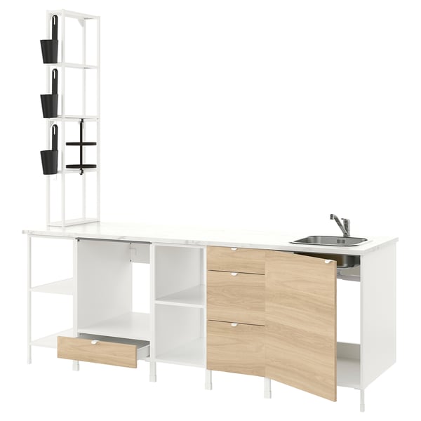 A modern, white and wooden kitchen setup with a sink and open storage shelves.