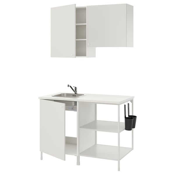 All-white ENHET kitchen unit: modern, compact design with open & closed storage, sink, shelves, chrome tap.
