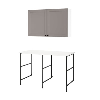 Grey IKEA ENHET wall cabinet with 2 doors & white countertop on black metal legs.