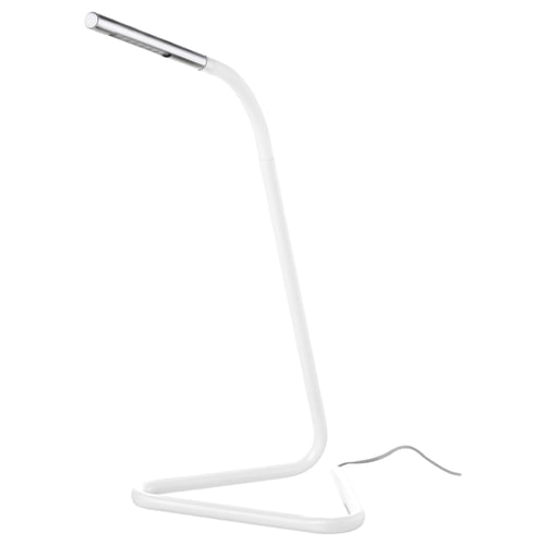 A sleek, white HÅRTE lamp with a flexible neck and minimalist design, standing on a v-shaped base.