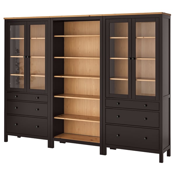 Black HEMNES storage unit: two glass-door cabinets on sides, four drawers, wooden shelves.