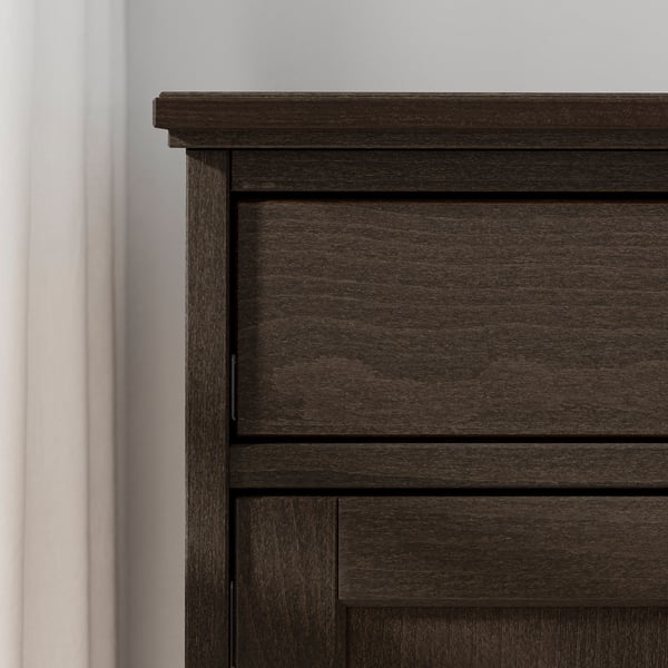 Dark brown wooden sideboard with panel design and folding doors.