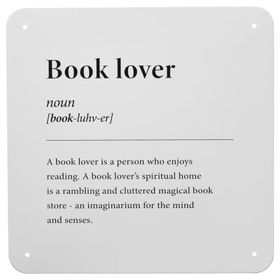 A grey metal booklover sign with description. Its square, simple, and informational.