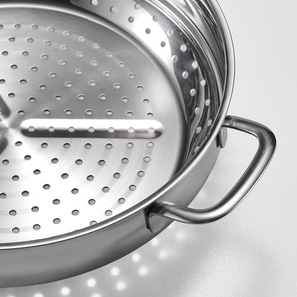 Silver stainless steel colander with large handle and drainage holes.