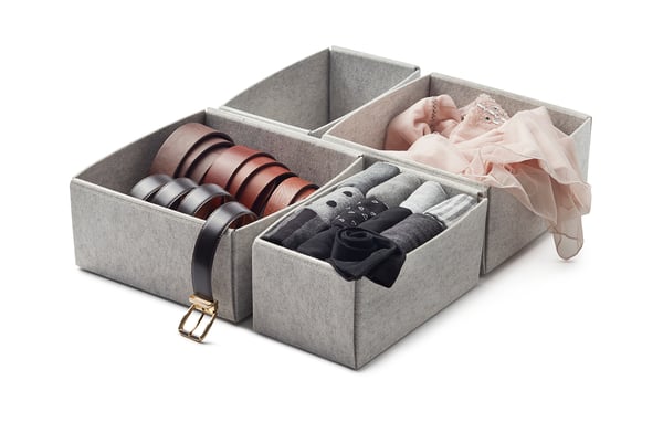 Grey felt organiser boxes store belts, socks, and underwear. Neatly arranges drawer items. Eco-friendly, made from recycled pet bottles.