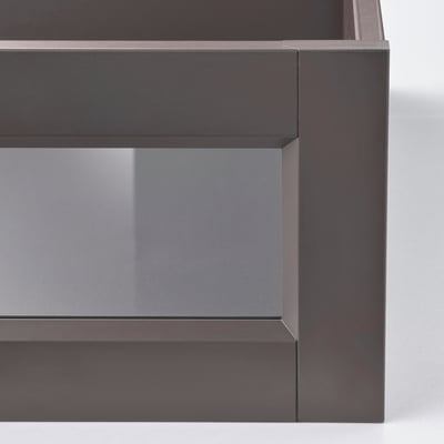 Dark grey modern drawer with glass front, sleek edges, and clean lines. Quality and craftsmanship.
