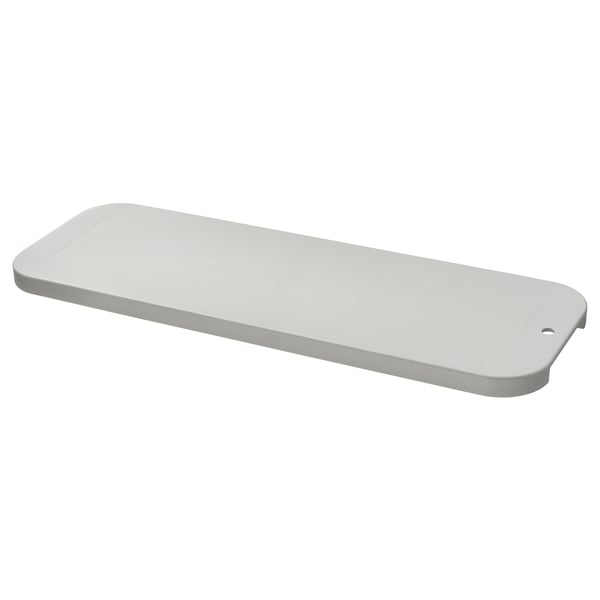 A white LILLHAVET chopping board with a lightweight, hollow design and non-slip feet, perfect for food preparation and serving.