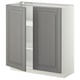 This image shows a grey, ikea METOD kitchen cabinet with two open doors, featuring beveled edges and adjustable shelves.