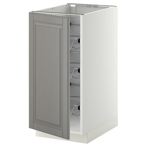 A grey METOD kitchen cabinet with a bevelled door and pull-out wire baskets.