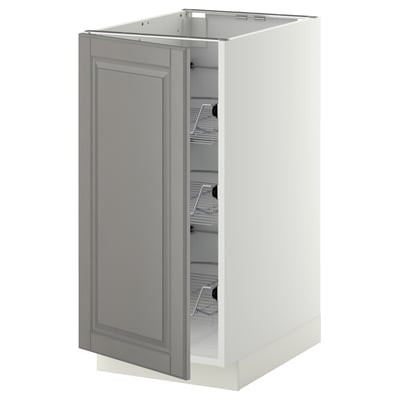 A grey METOD kitchen cabinet with a bevelled door and pull-out wire baskets.