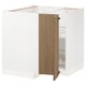 Ikea METOD kitchen unit with walnut door and white frame.