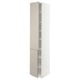 METOD kitchen cabinet in beige. Tall, narrow, white with two adjustable shelves. Two attachable beige doors. Modern, minimalist design.