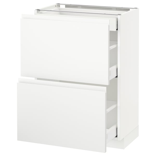 White METOD kitchen cabinet with soft-close drawers and sleek design.
