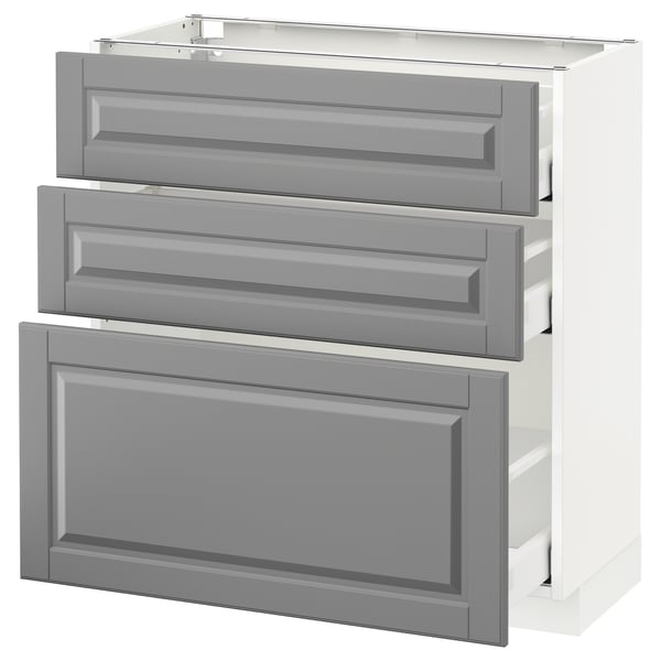A grey and white METOD kitchen unit with three drawers and a cabinet door. The design is traditional with bevelled edges.