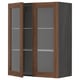 METOD kitchen cabinet with walnut-brown doors and glass panels.