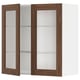 METOD kitchen unit with walnut foil doors and glass shelves.