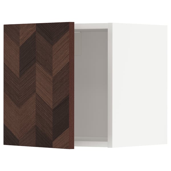 Dark wood-patterned METOD kitchen cabinet, partially open, nickel hinge.
