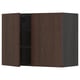 Dark brown wooden kitchen cabinet with two open doors, revealing inner shelves.