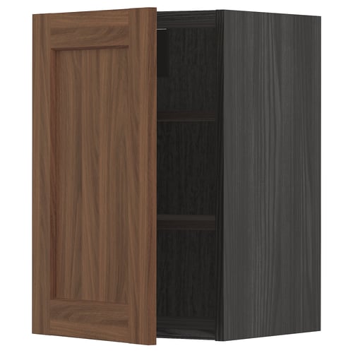 Walnut-colored METOD kitchen cabinet with adjustable shelf, rectangular shape, and simple design. One door open.