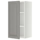 METOD wall cabinet in soft grey with adjustable shelf and bevelled door.